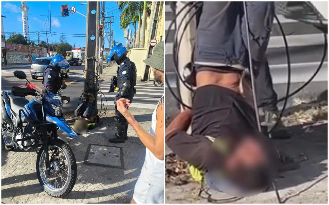 Suspeito amarrado em um poste de concreto por populares em via pública de Fortaleza.